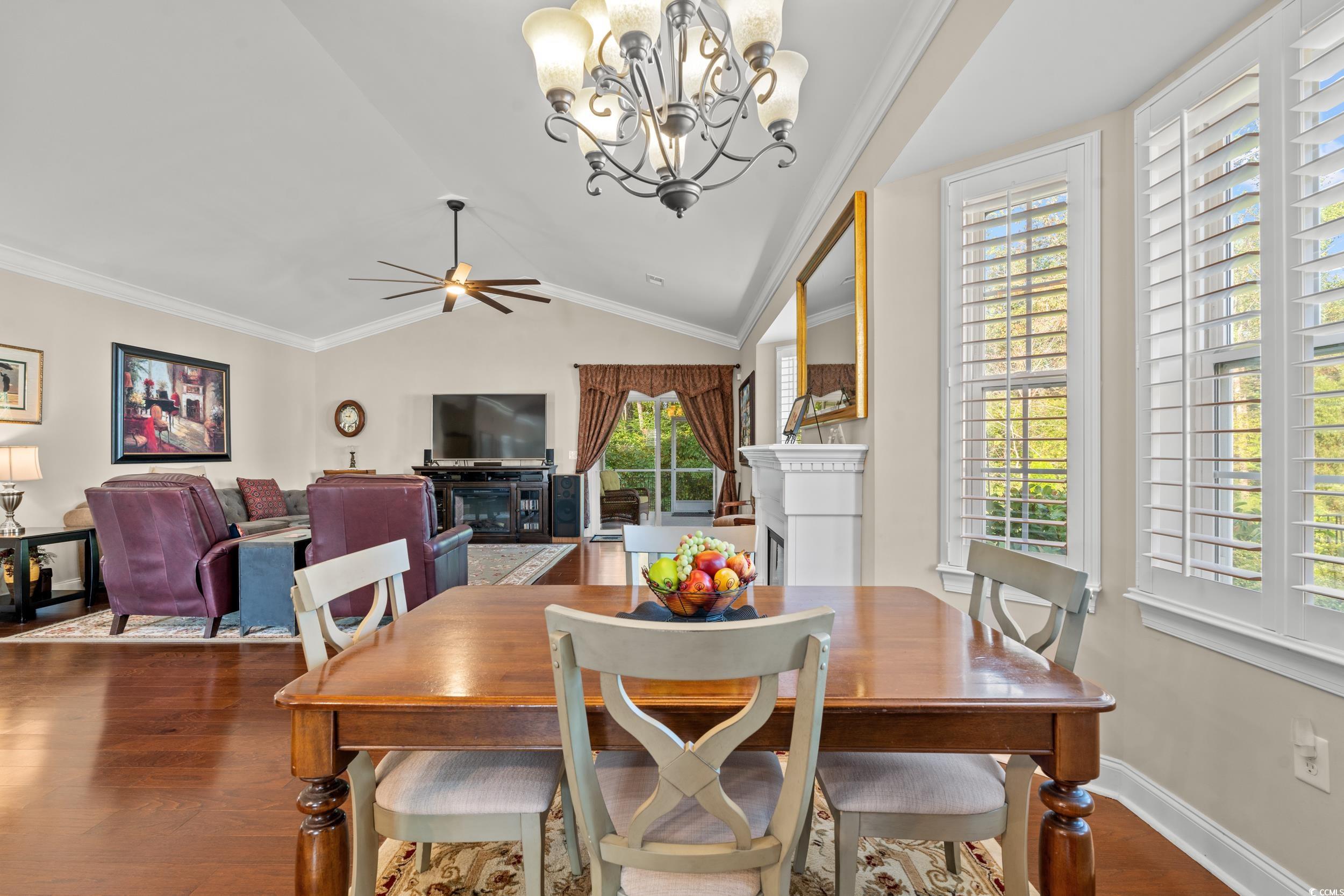 860 Tilly Lake Road Conway, SC 29526 - Photo 3 of 38 Dining room with ceiling fan with notable chandeli