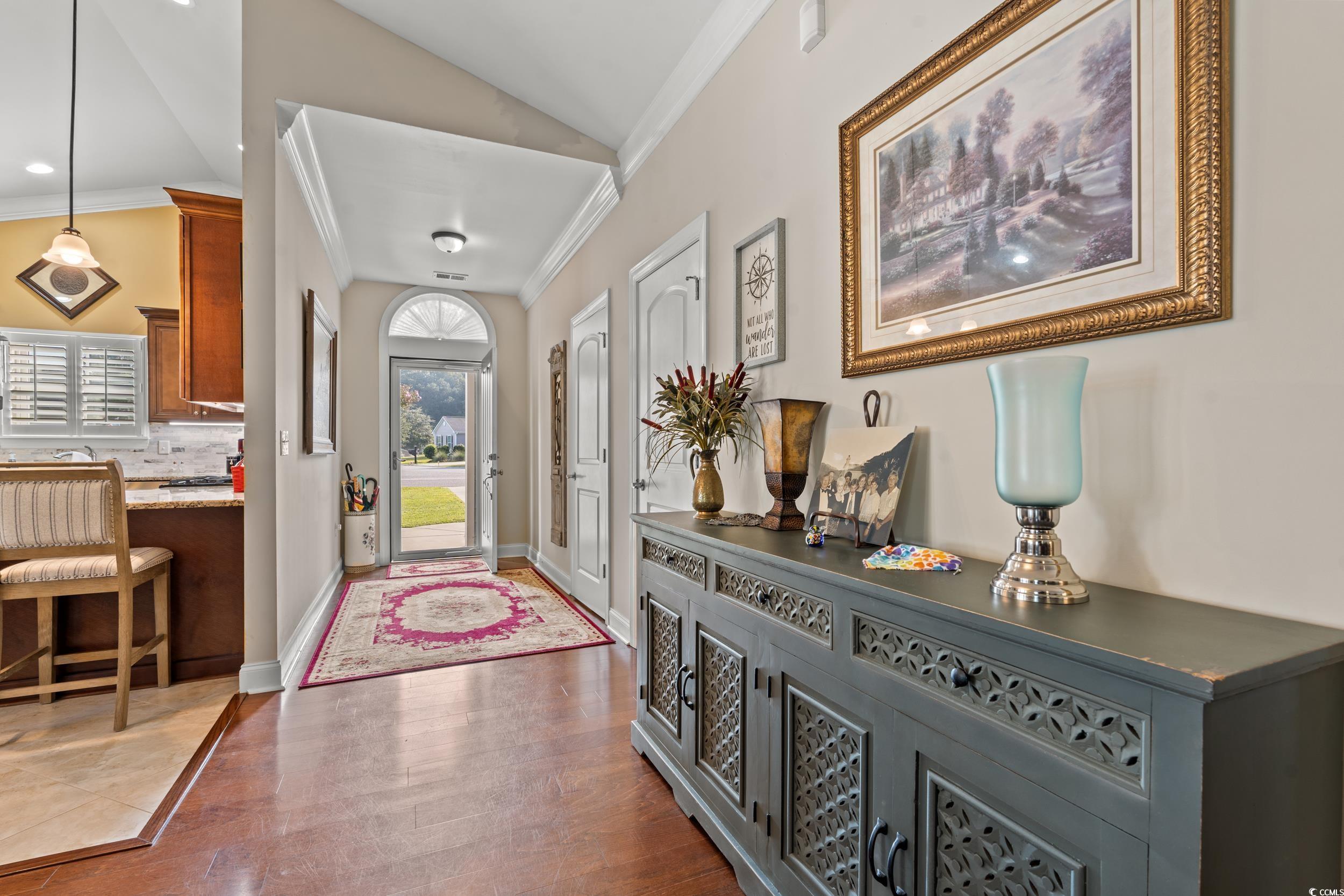 860 Tilly Lake Road Conway, SC 29526 - Photo 4 of 38 Entrance foyer with vaulted ceiling, dark hardwood