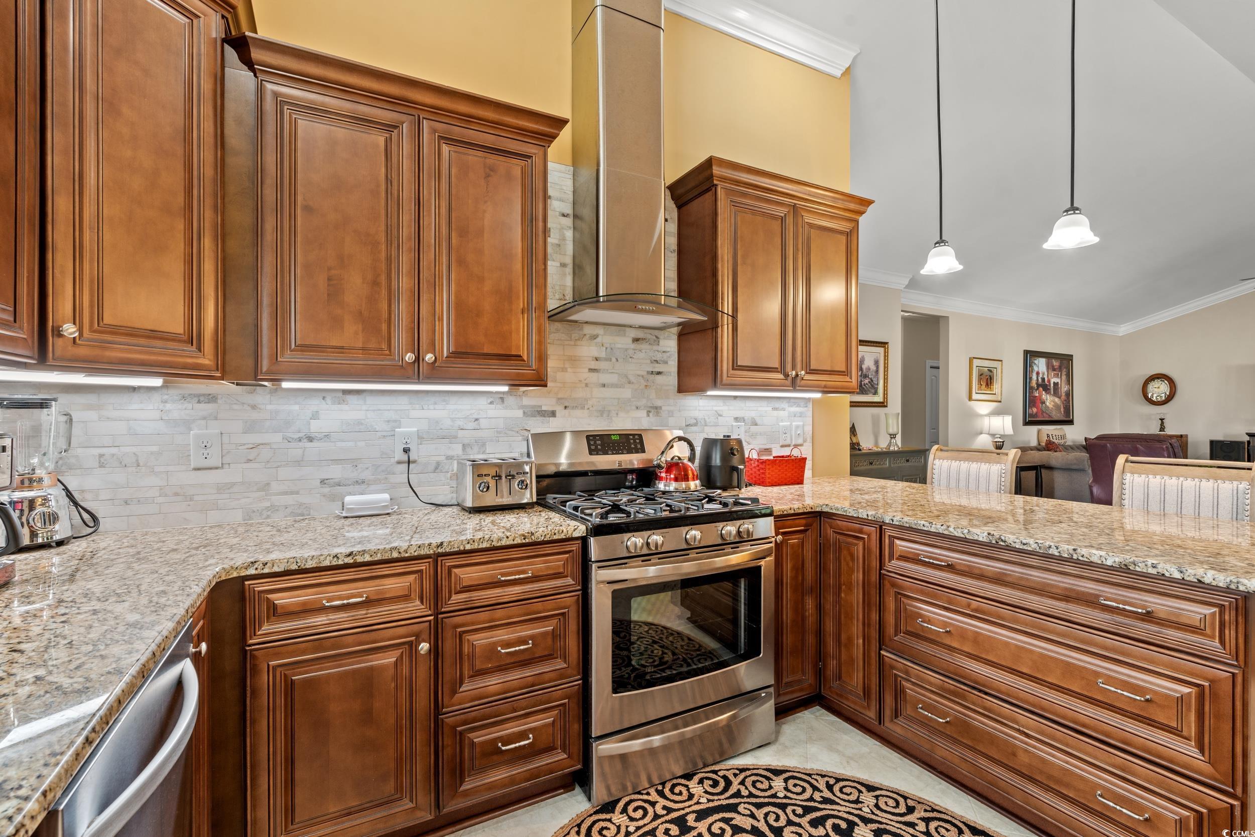 860 Tilly Lake Road Conway, SC 29526 - Photo 10 of 38 Kitchen featuring wall chimney exhaust hood, stain