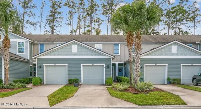 front view of a house and a yard