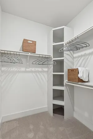 a view of an empty room with empty racks