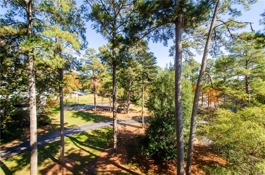 3530 Piedmont Road Northeast, Unit F5 Atlanta, GA 30305 - Photo 2 of 28 a view of a yard
