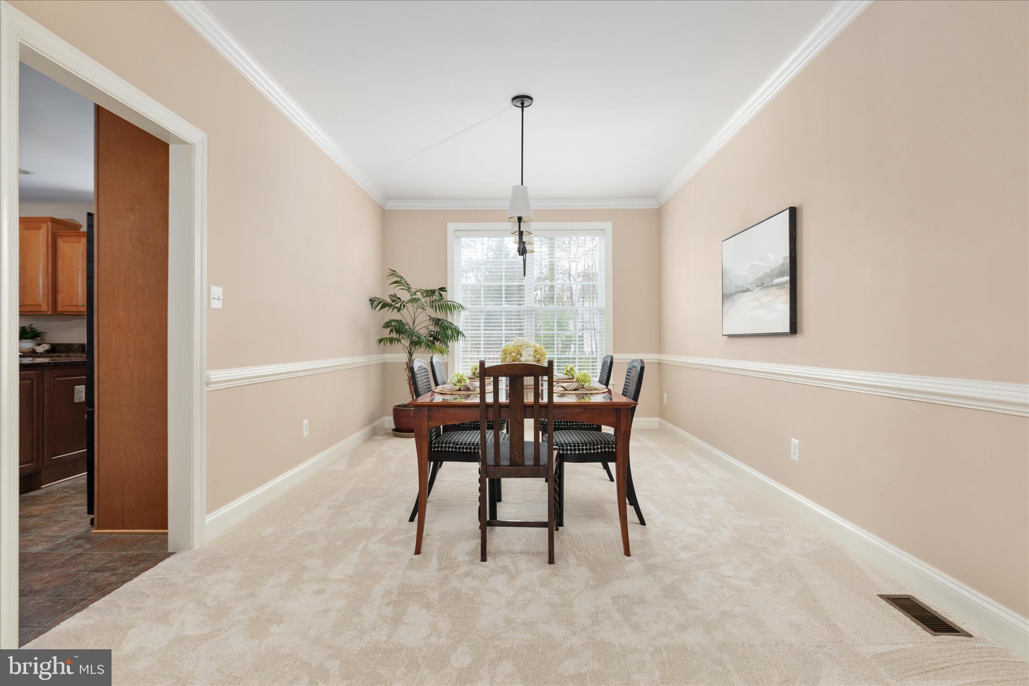 10116 Middlebrooks Terrace Nokesville, VA 20181 - Photo 15 of 78 a dining room with furniture and window