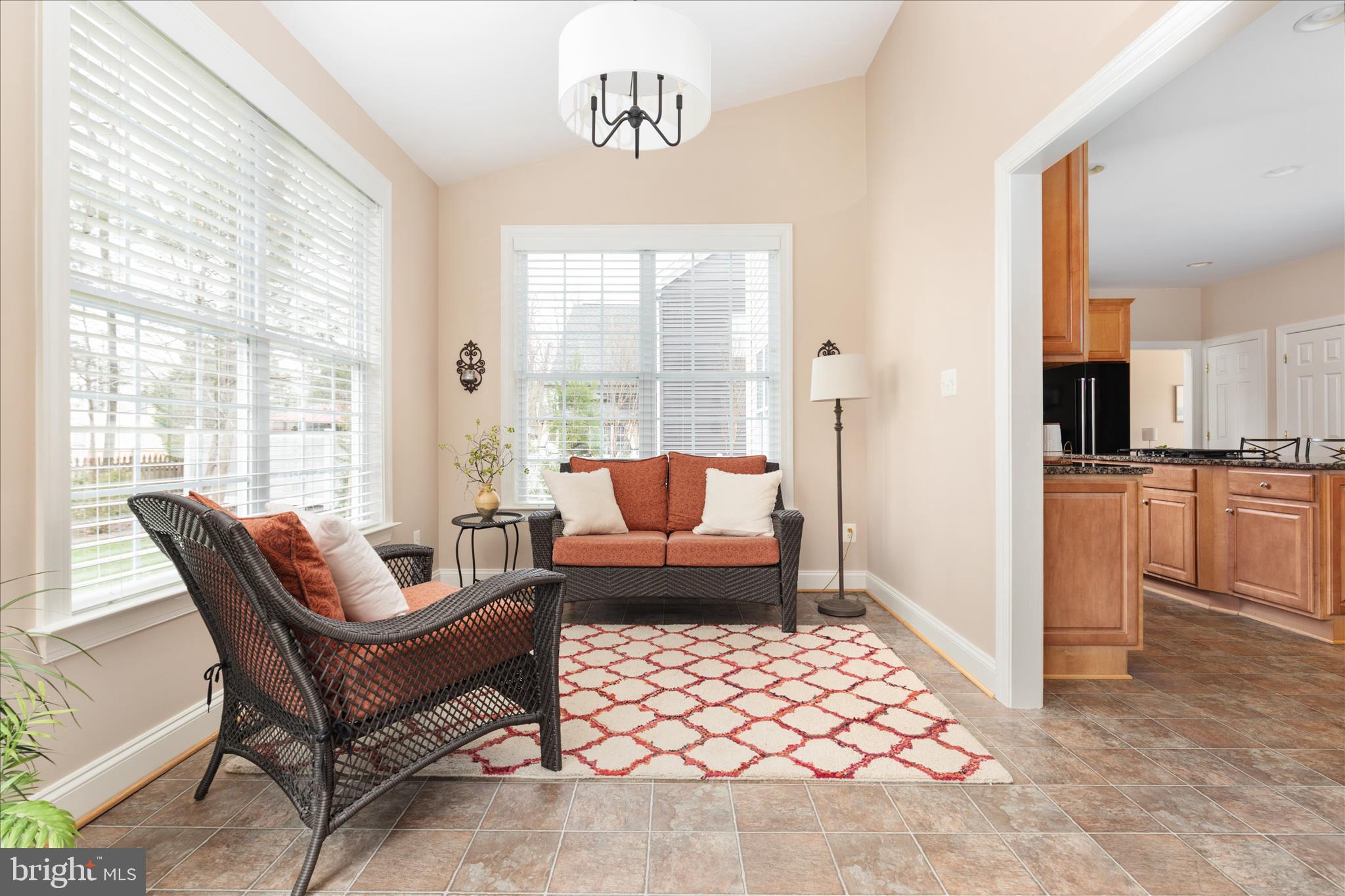 10116 Middlebrooks Terrace Nokesville, VA 20181 - Photo 21 of 78 a living room with furniture and a large window