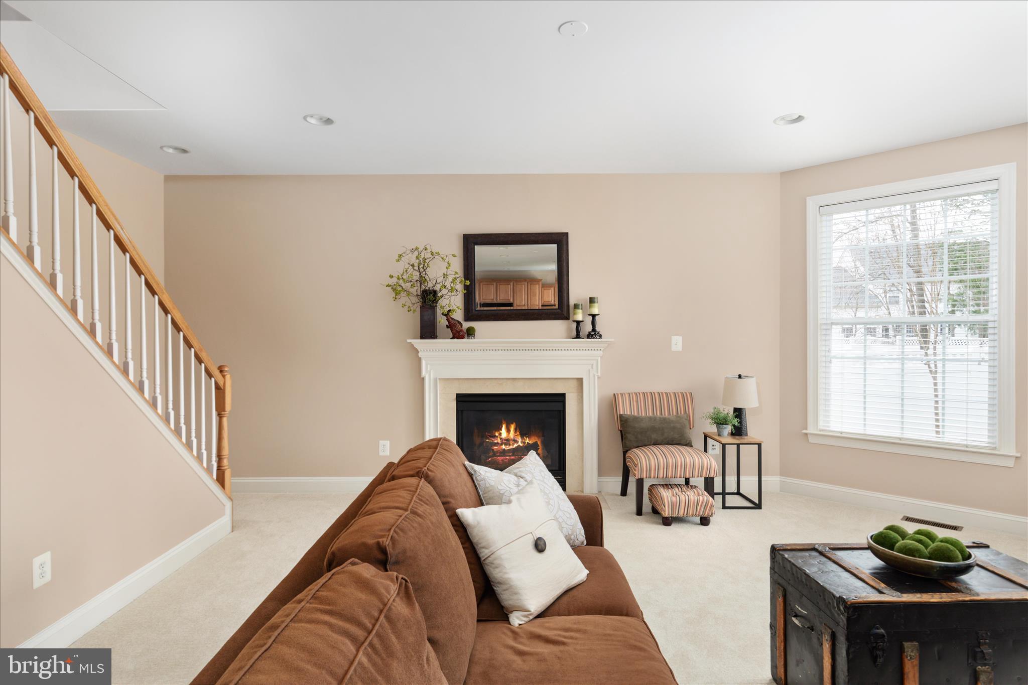 10116 Middlebrooks Terrace Nokesville, VA 20181 - Photo 24 of 78 a living room with furniture fireplace and a window