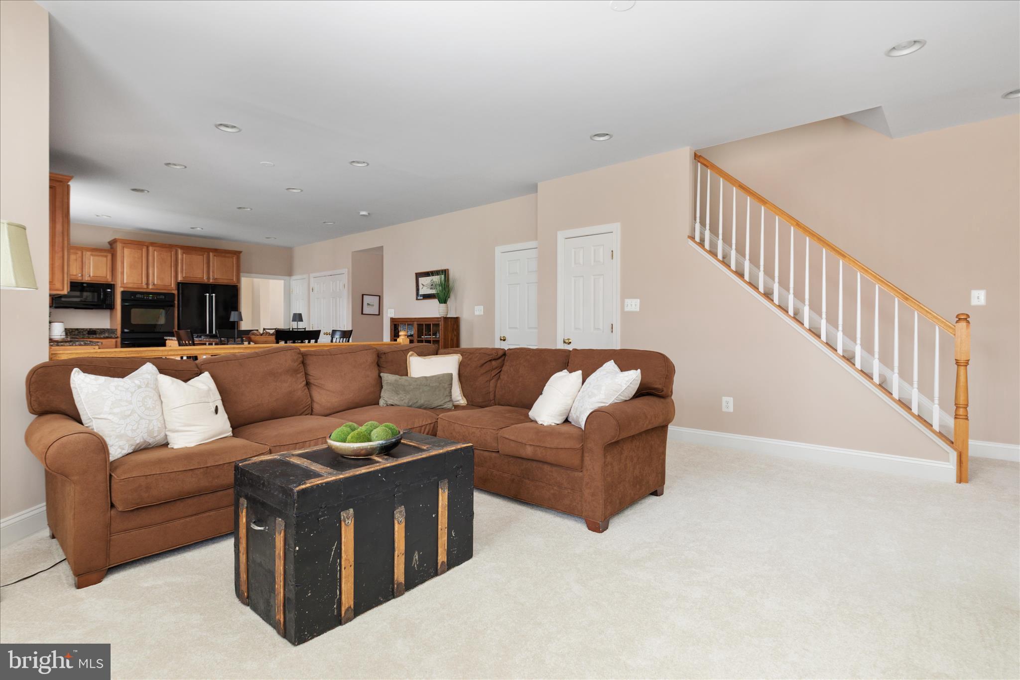 10116 Middlebrooks Terrace Nokesville, VA 20181 - Photo 26 of 78 a living room with furniture and a view of kitchen