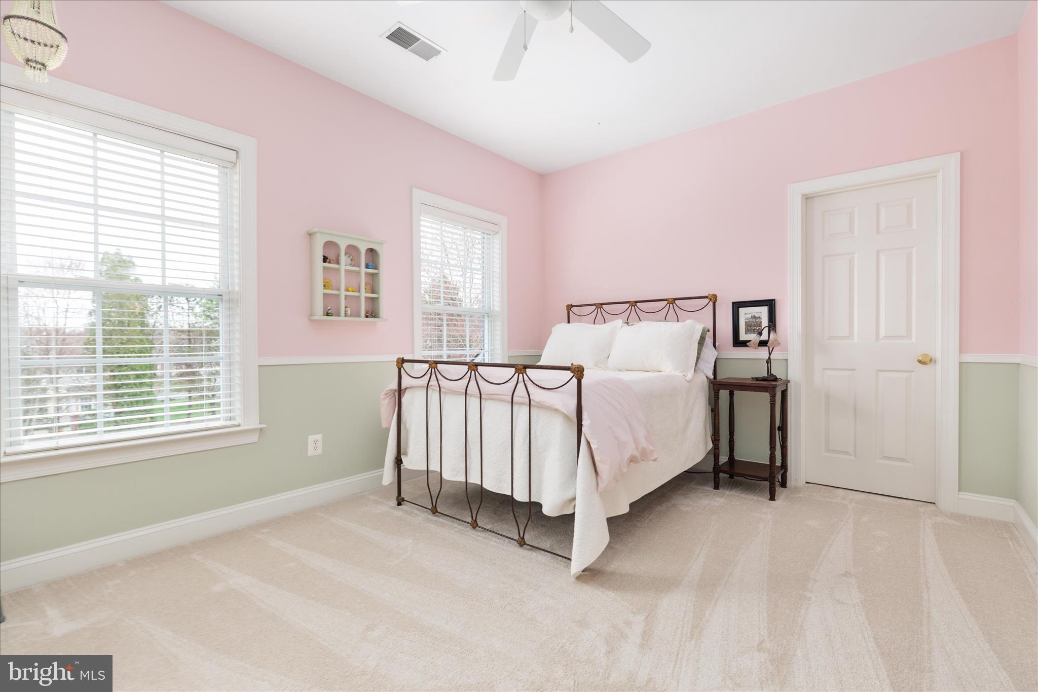 10116 Middlebrooks Terrace Nokesville, VA 20181 - Photo 29 of 78 a bed sitting in a bedroom next to a window