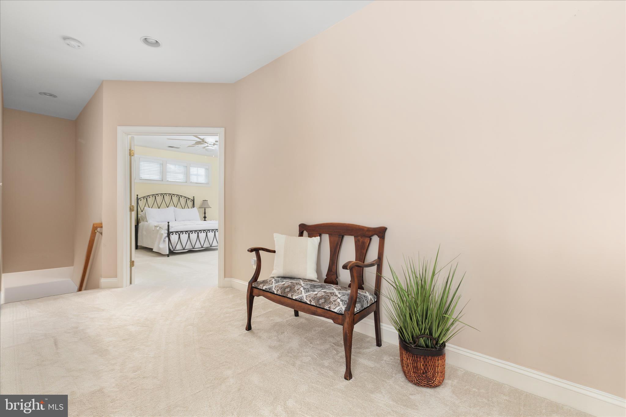 10116 Middlebrooks Terrace Nokesville, VA 20181 - Photo 35 of 78 a living room with furniture and a potted plant