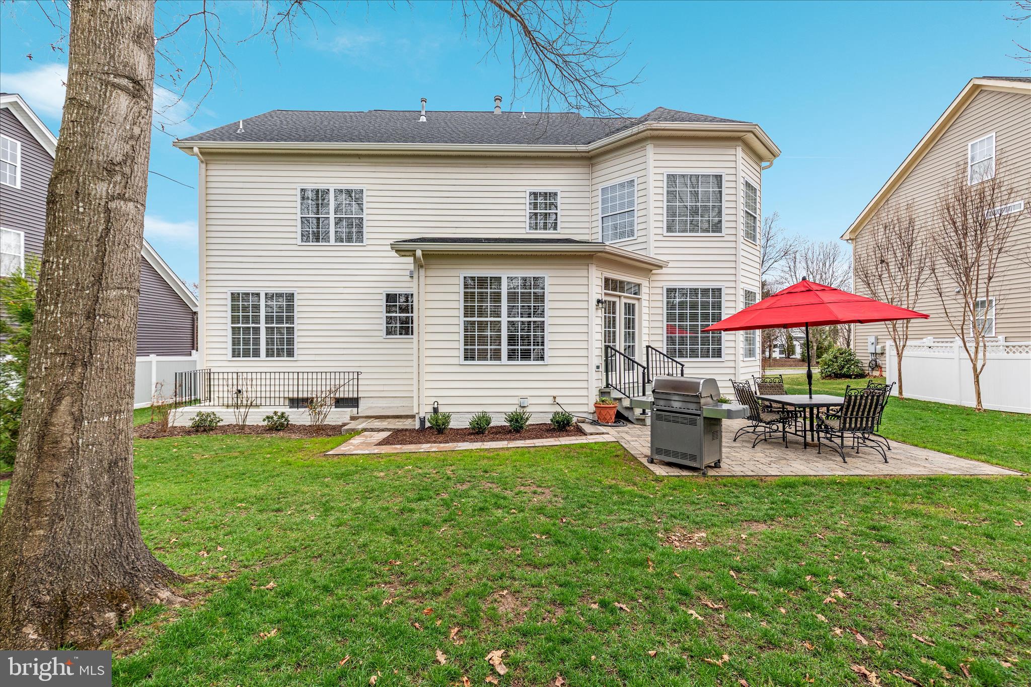 10116 Middlebrooks Terrace Nokesville, VA 20181 - Photo 55 of 78 a view of a house with a yard and sitting area