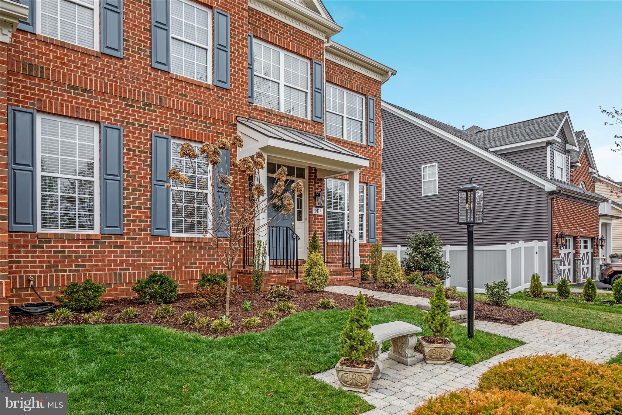 10116 Middlebrooks Terrace Nokesville, VA 20181 - Photo 57 of 78 a front view of a house with a yard