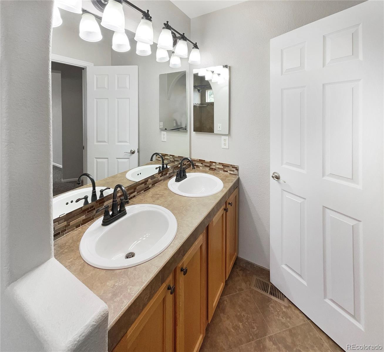 10674 Cherrington Street Highlands Ranch, CO 80126 - Photo 14 of 20 Gallery Image 14