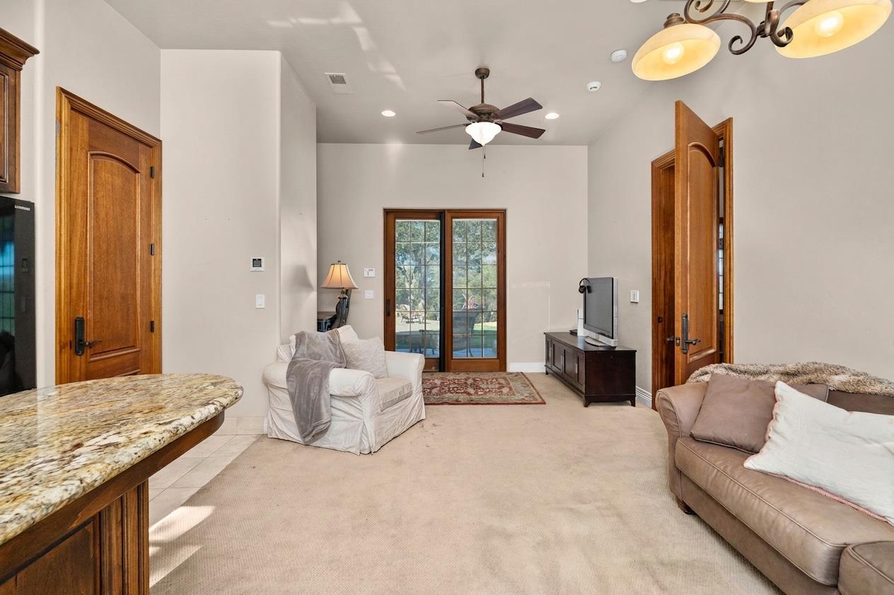 1100 Cold Springs Road Placerville, CA 95667 - Photo 60 of 97 ADU - Spacious room featuring vaulted ceilings, a ceiling fan, and French doors with exterior views