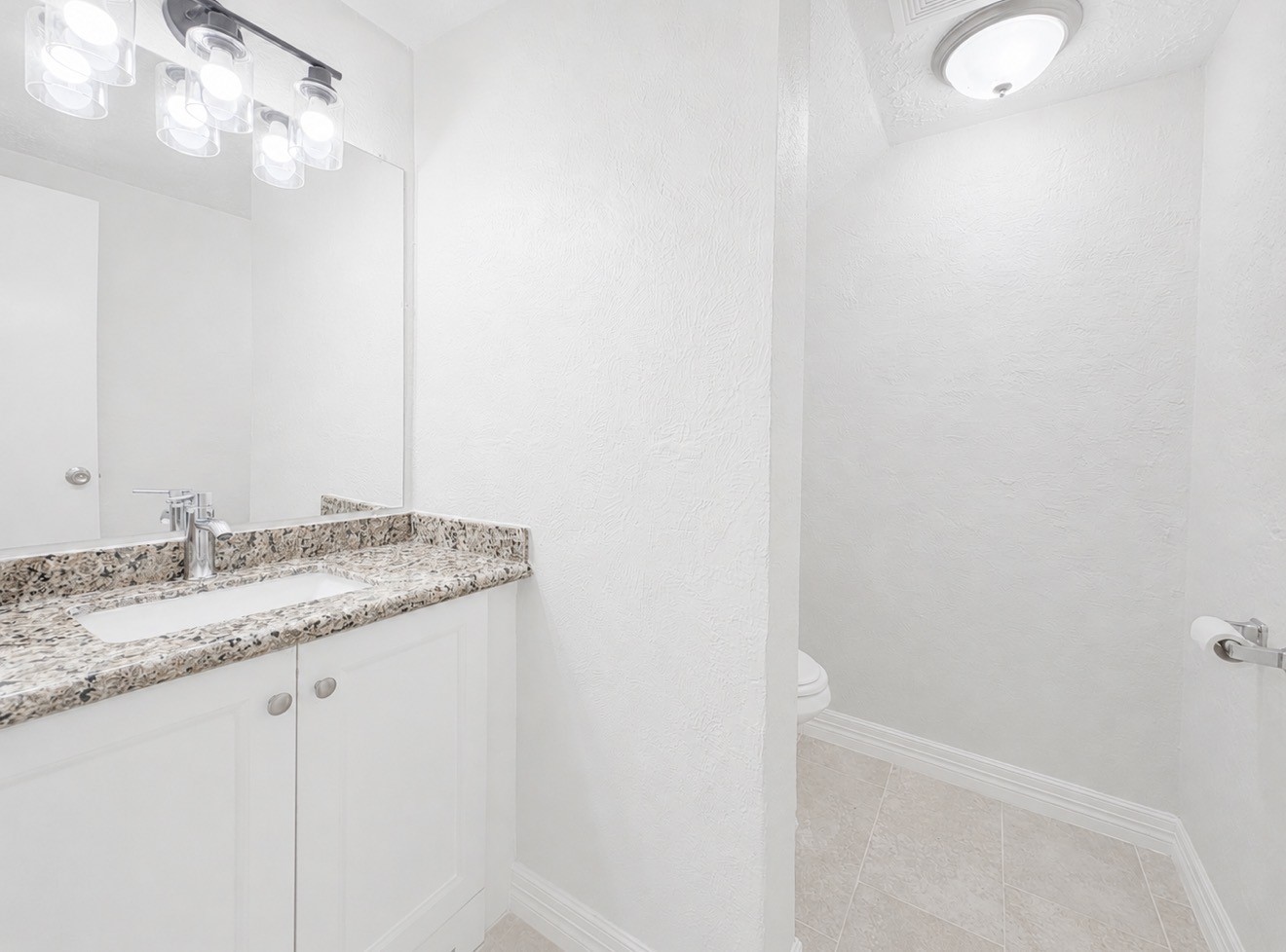 8407 Riverside Walk Lane Houston, TX 77064 - Photo 18 of 33 Half bath downstairs with cabinet storage and private toilet room. All toilets are new.