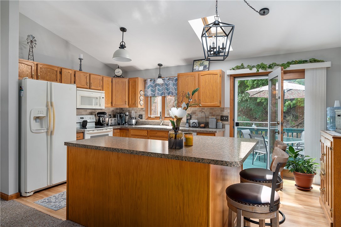 61 Breault Avenue Woonsocket, RI 02895 - Photo 3 of 33 LIGHT AND BRIGHT EAT IN KITCHEN WITH ISLAND