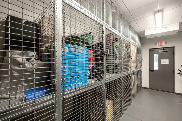 a view of street with parked cars