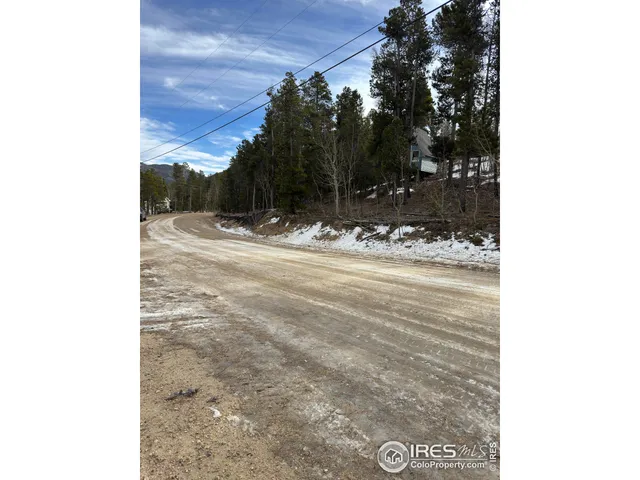 a view of an ocean and a mountain