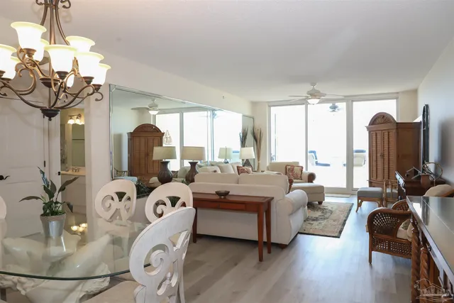 a kitchen with stainless steel appliances white cabinets and a sink