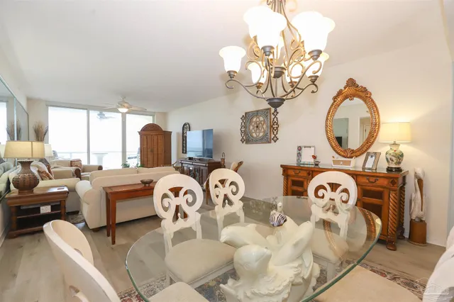 a bedroom with two beds and a large bed