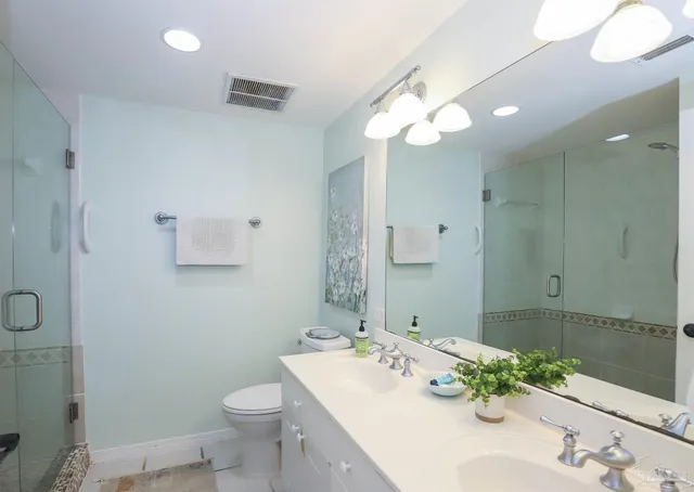 a view of a livingroom with furniture and a flat screen tv