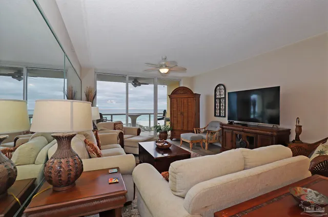 a kitchen with stainless steel appliances a refrigerator sink and cabinets