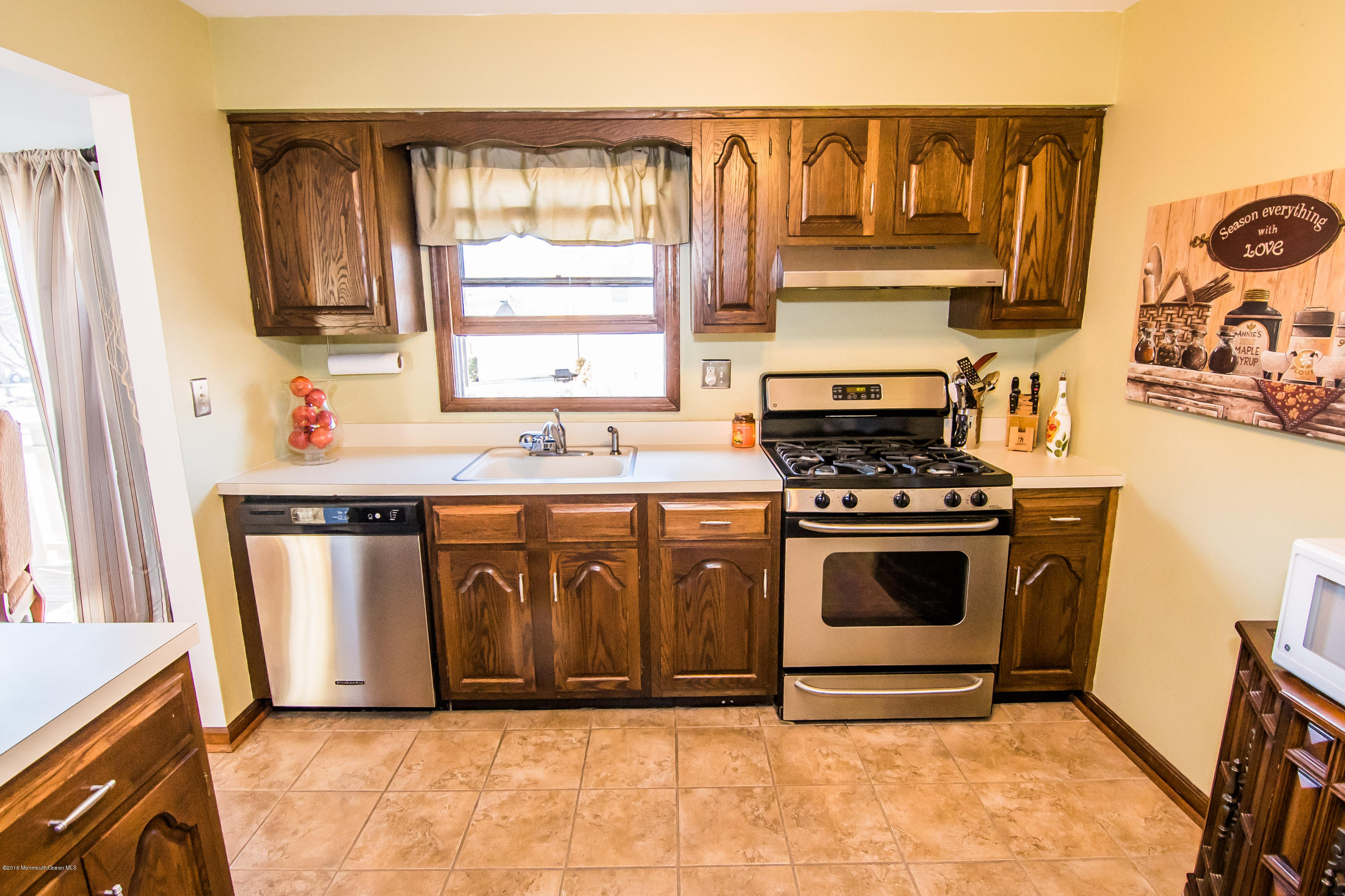 20 Pinckney Road, Unit A1 Red Bank, NJ 07701 - Photo 11 of 25 a kitchen with a stove and a sink