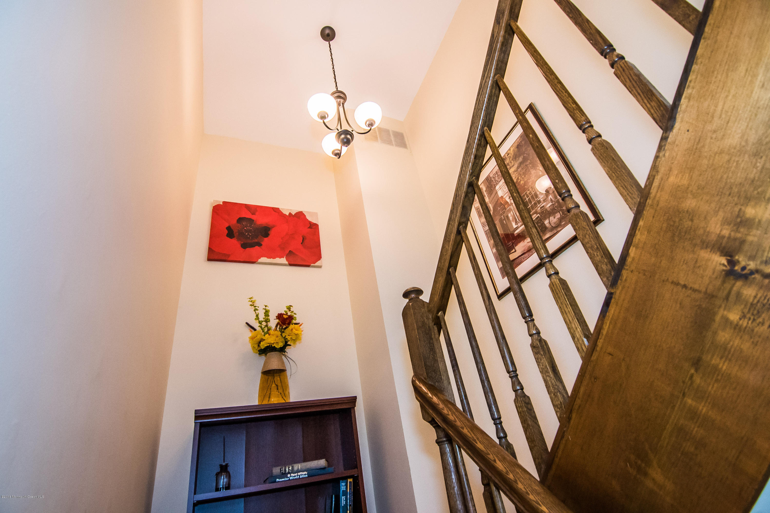 20 Pinckney Road, Unit A1 Red Bank, NJ 07701 - Photo 13 of 25 a view of a hallway with a potted plant