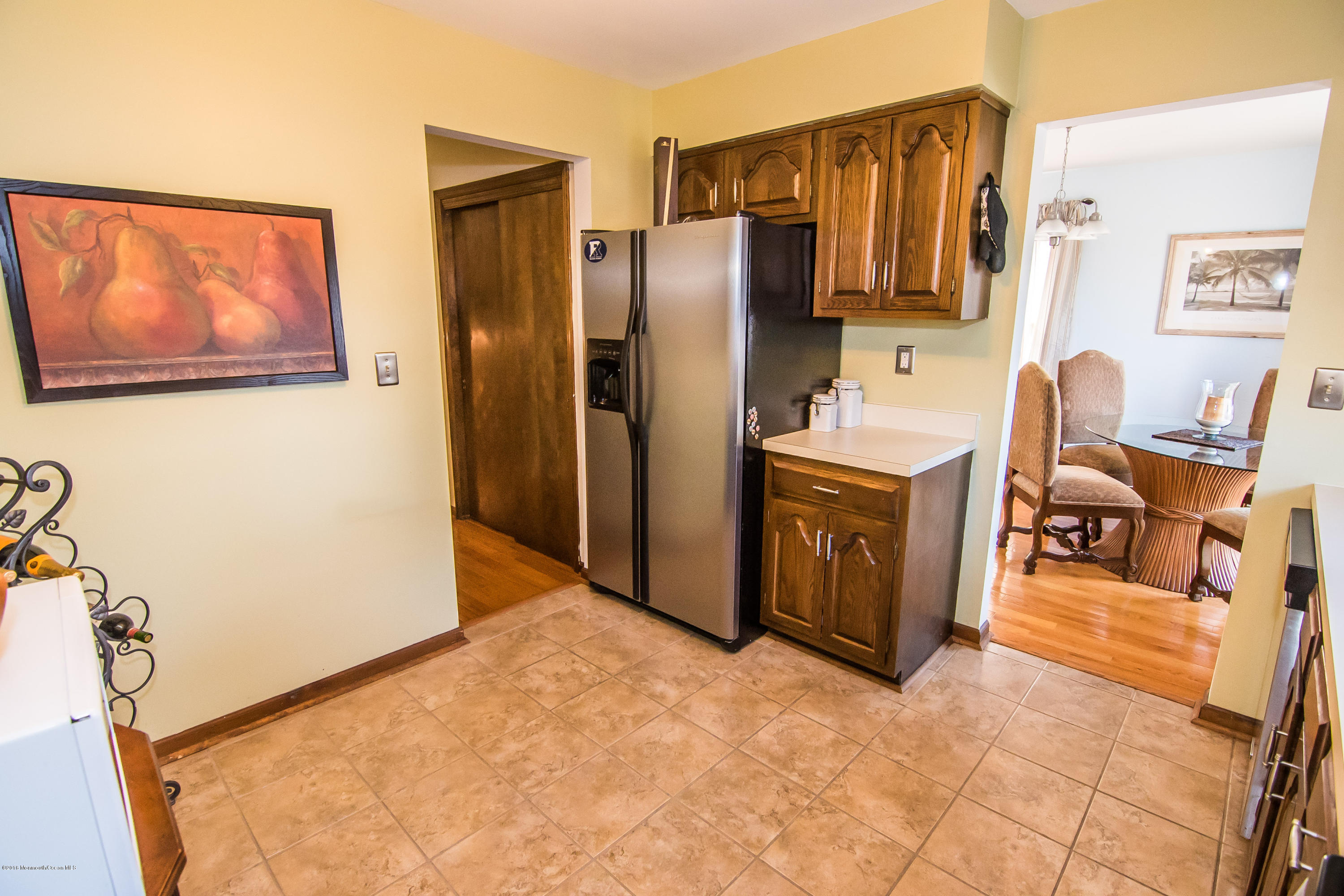 20 Pinckney Road, Unit A1 Red Bank, NJ 07701 - Photo 10 of 25 a kitchen with stainless steel appliances a refrigerator and a stove top oven