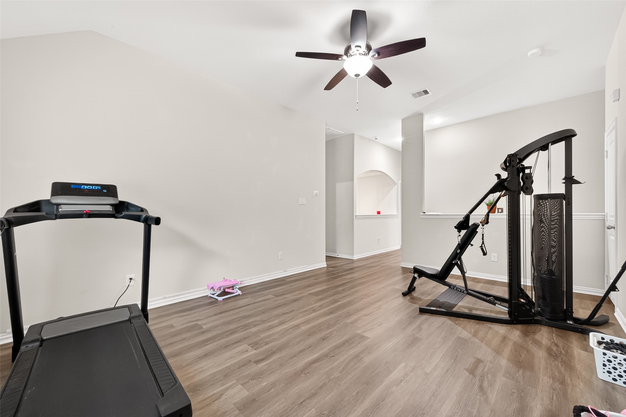 8 Landscape Court Conroe, TX 77301 - Photo 32 of 43 a view of a room with gym equipment