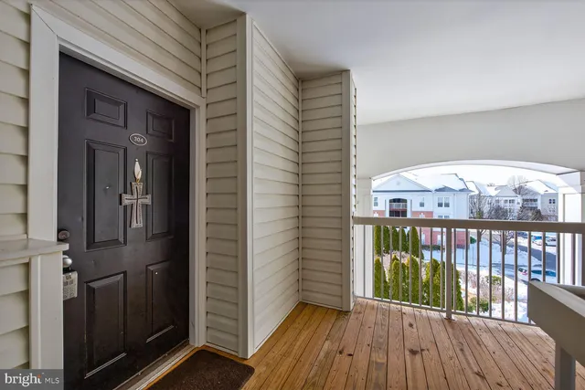a view of a balcony with wooden floor