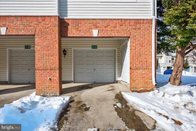 a front view of a building with street view