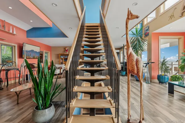 a view of outdoor space with lots of furniture and wooden floor