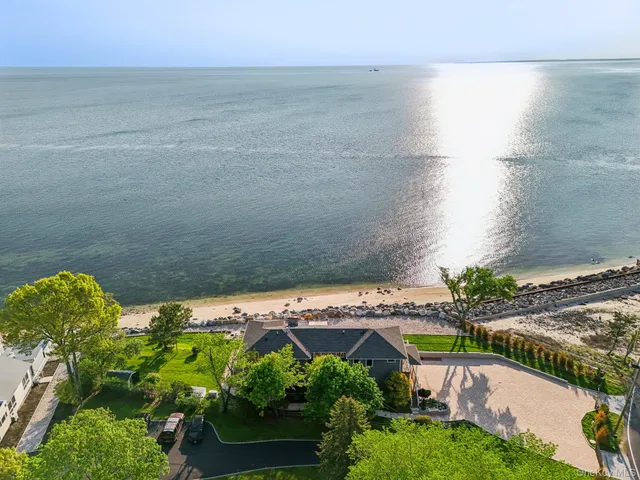 a view of a lake with a big yard