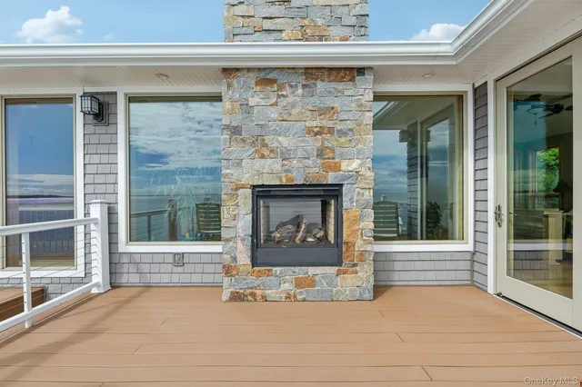 a view of fireplace and window in a room