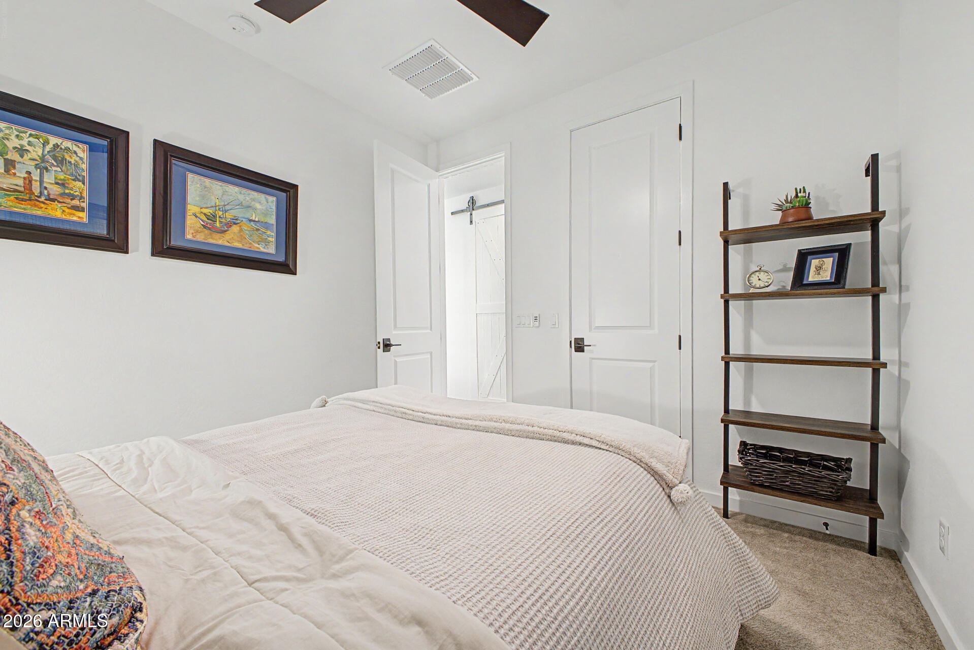 819 West Deer Creek Road Phoenix, AZ 85048 - Photo 56 of 76 a bedroom with a bed and a cabinets