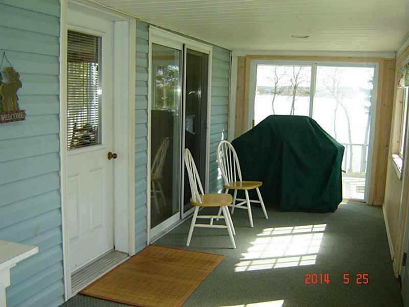 738 Beaulieu Road St. David, ME 04773 - Photo 19 of 33 Sunroom. Side Enclosed Porch