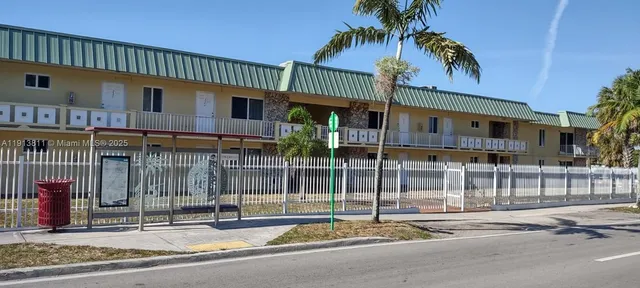 a view of a building with a patio