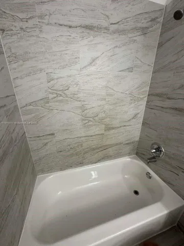 a bathroom with a bathtub
