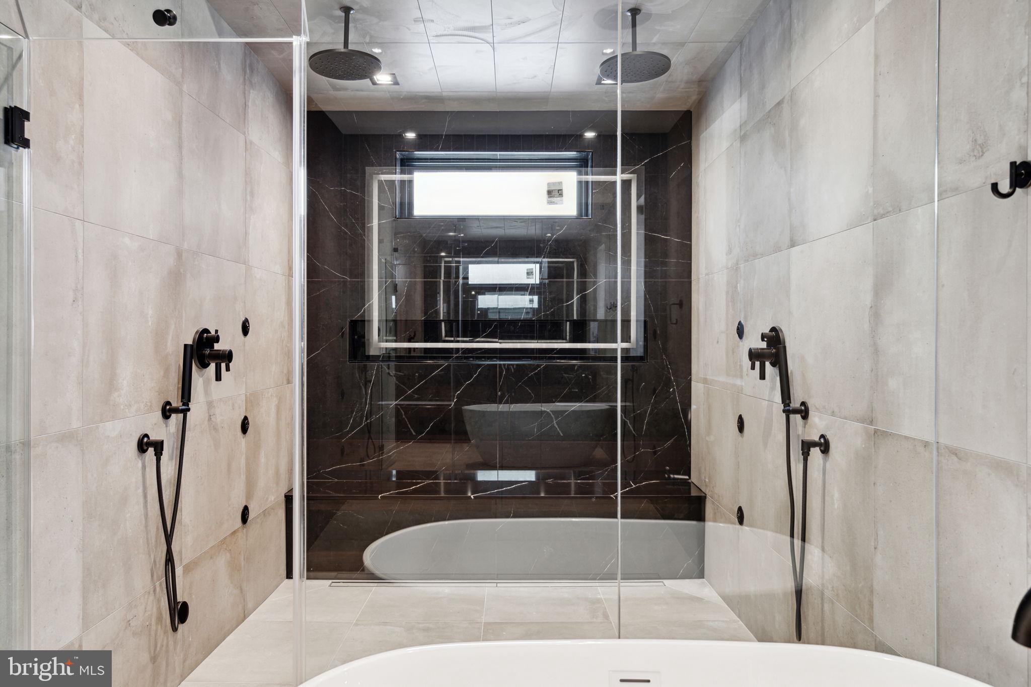 110 South Bonsall Street Philadelphia, PA 19103 - Photo 20 of 25 a bathroom with a sink a toilet and shower