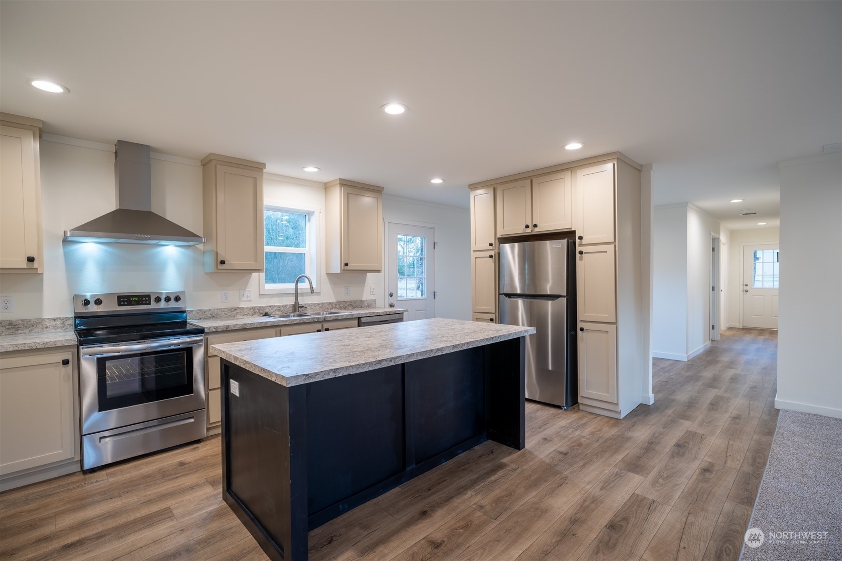 789 Chandler Road Chehalis, WA 98532 - Photo 13 of 17 a kitchen with stainless steel appliances granite countertop a sink stove and refrigerator
