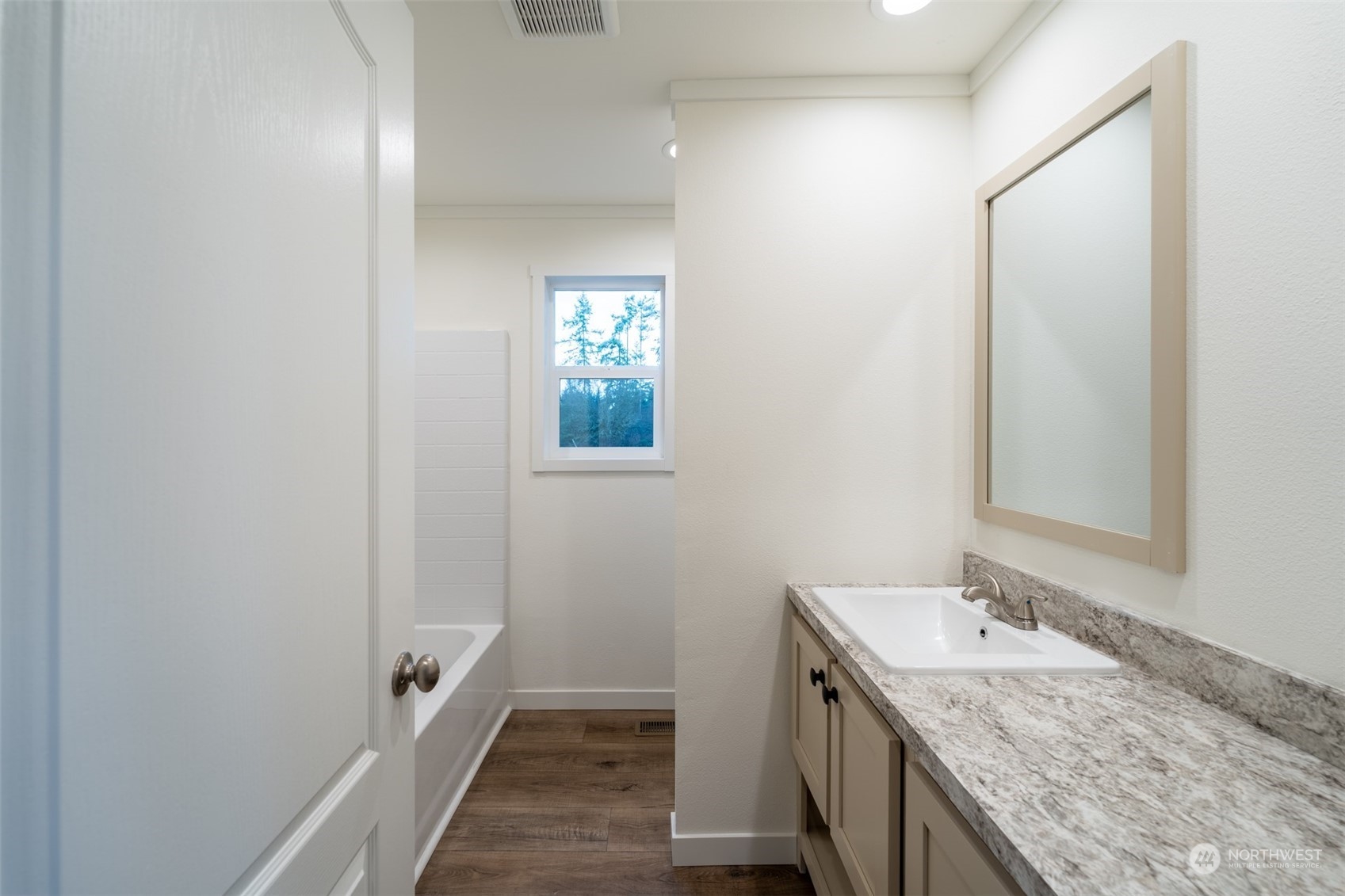 789 Chandler Road Chehalis, WA 98532 - Photo 16 of 17 a bathroom with a granite countertop sink and a mirror