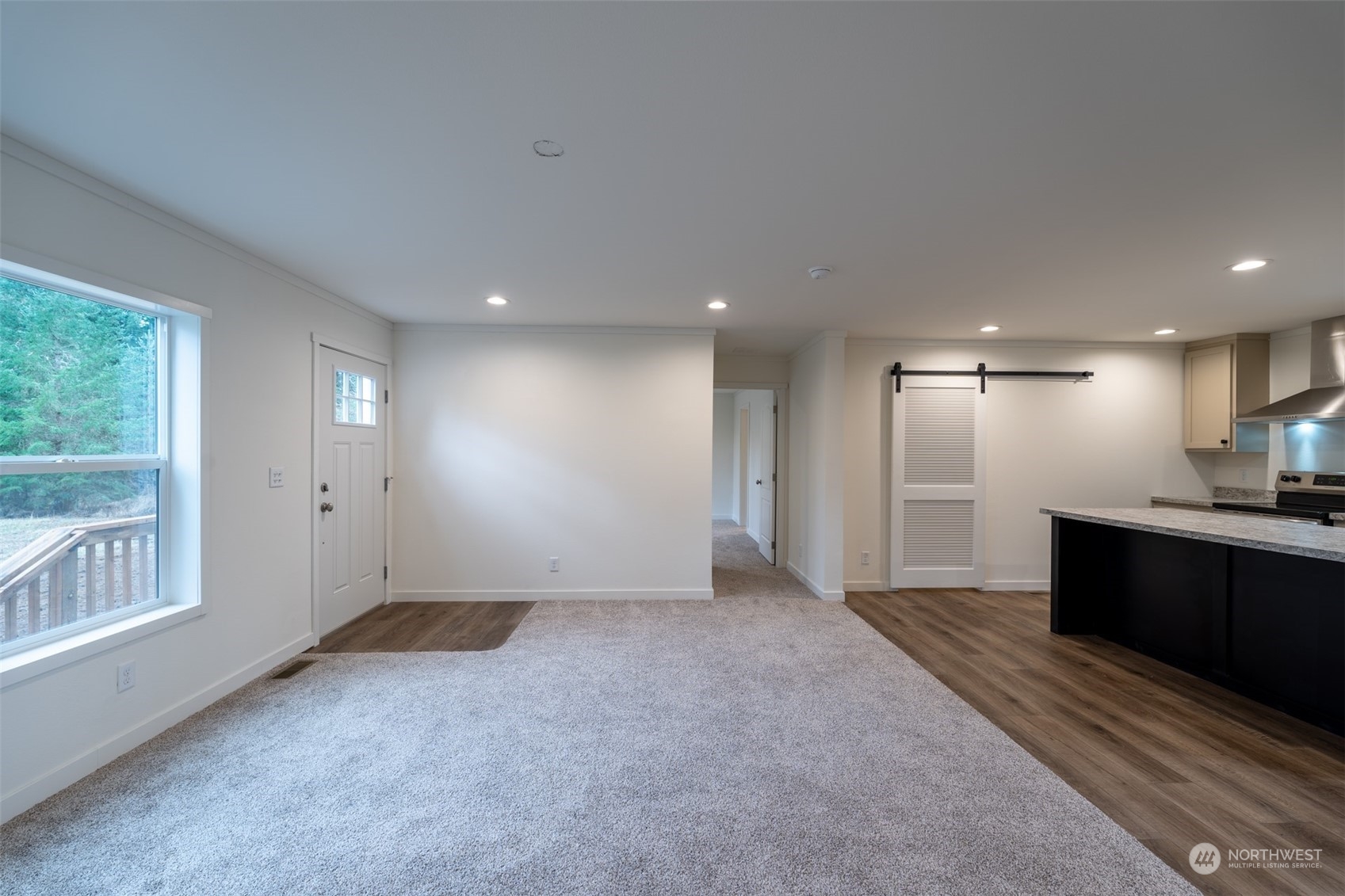 789 Chandler Road Chehalis, WA 98532 - Photo 2 of 17 a view of a big room with windows and kitchen view