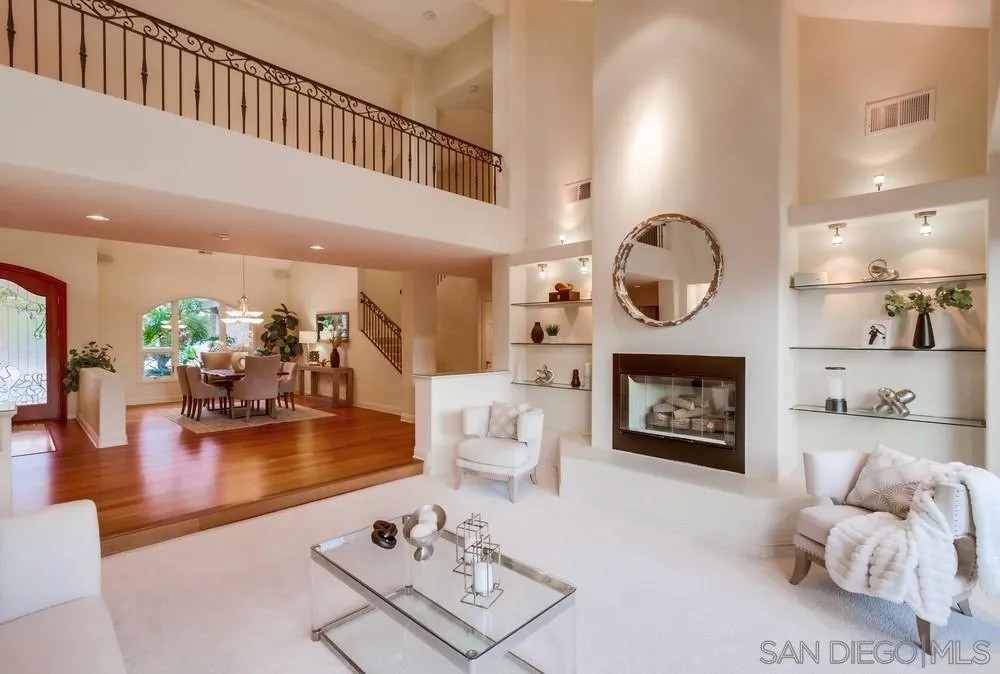 16052 Country Day Road Poway, CA 92064 - Photo 27 of 75 a living room with furniture and a fireplace