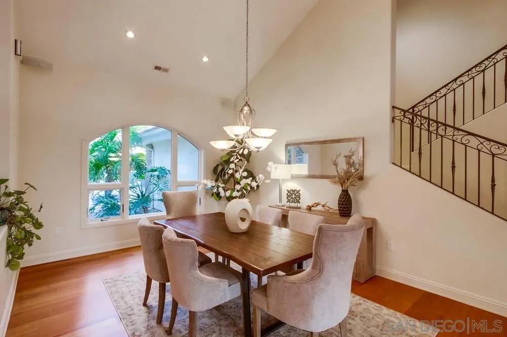 16052 Country Day Road Poway, CA 92064 - Photo 28 of 75 a view of a dining room with furniture window and wooden floor