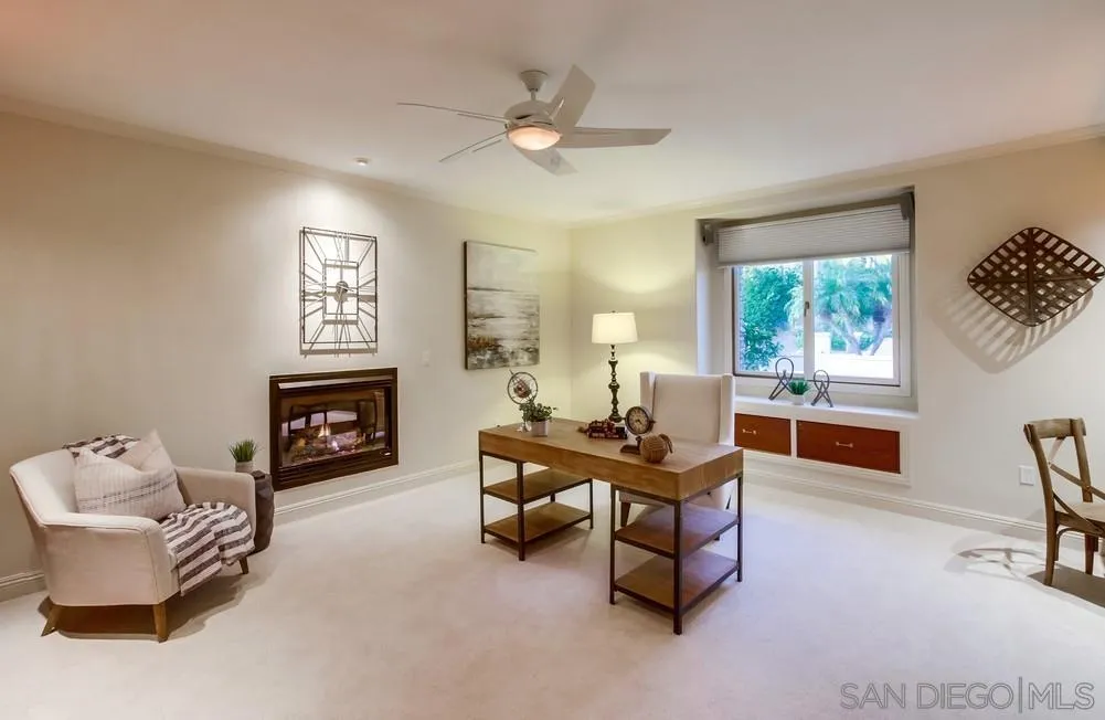 16052 Country Day Road Poway, CA 92064 - Photo 39 of 75 a living room with furniture and a fireplace
