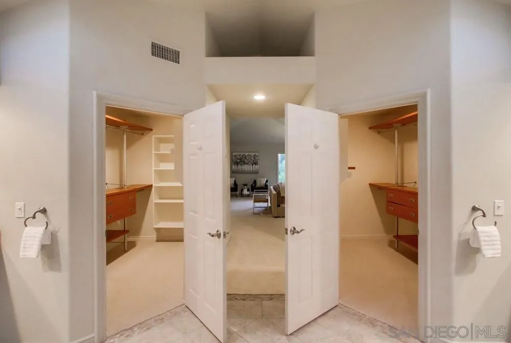 16052 Country Day Road Poway, CA 92064 - Photo 50 of 75 a view of a hallway with bathroom and bathroom