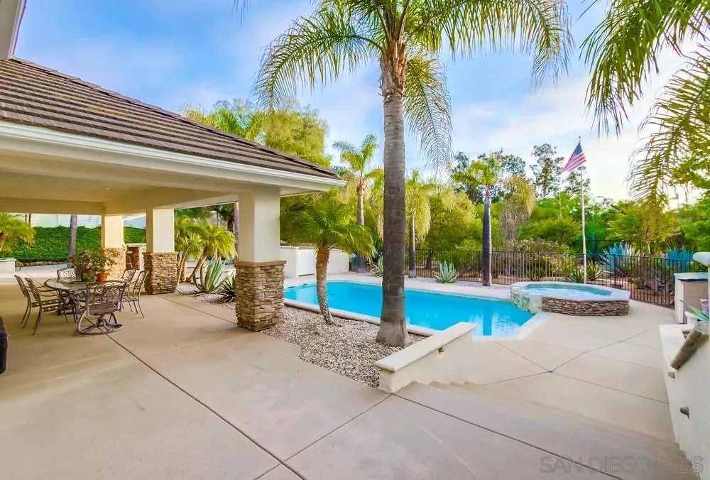 16052 Country Day Road Poway, CA 92064 - Photo 59 of 75 a view of a patio with swimming pool and sitting area