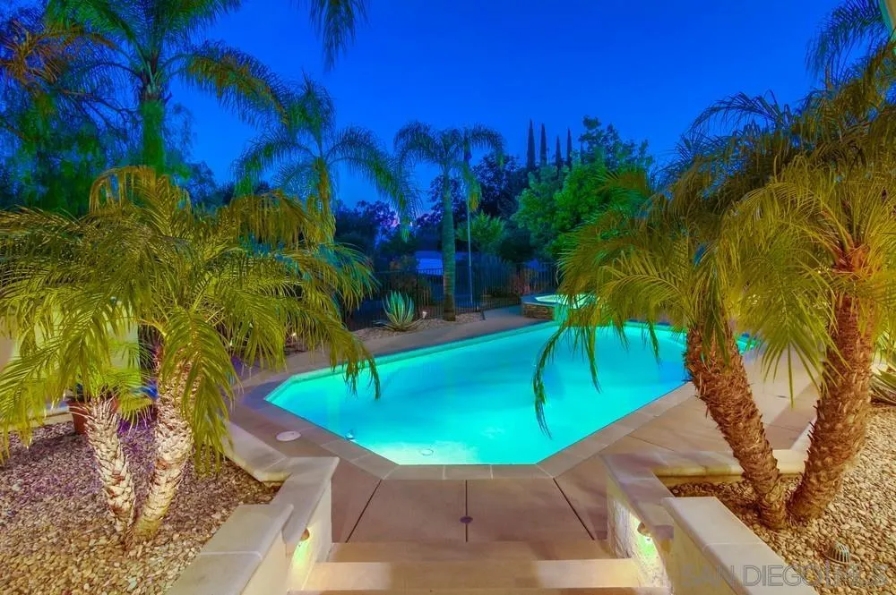 16052 Country Day Road Poway, CA 92064 - Photo 6 of 75 a view of a swimming pool with a yard