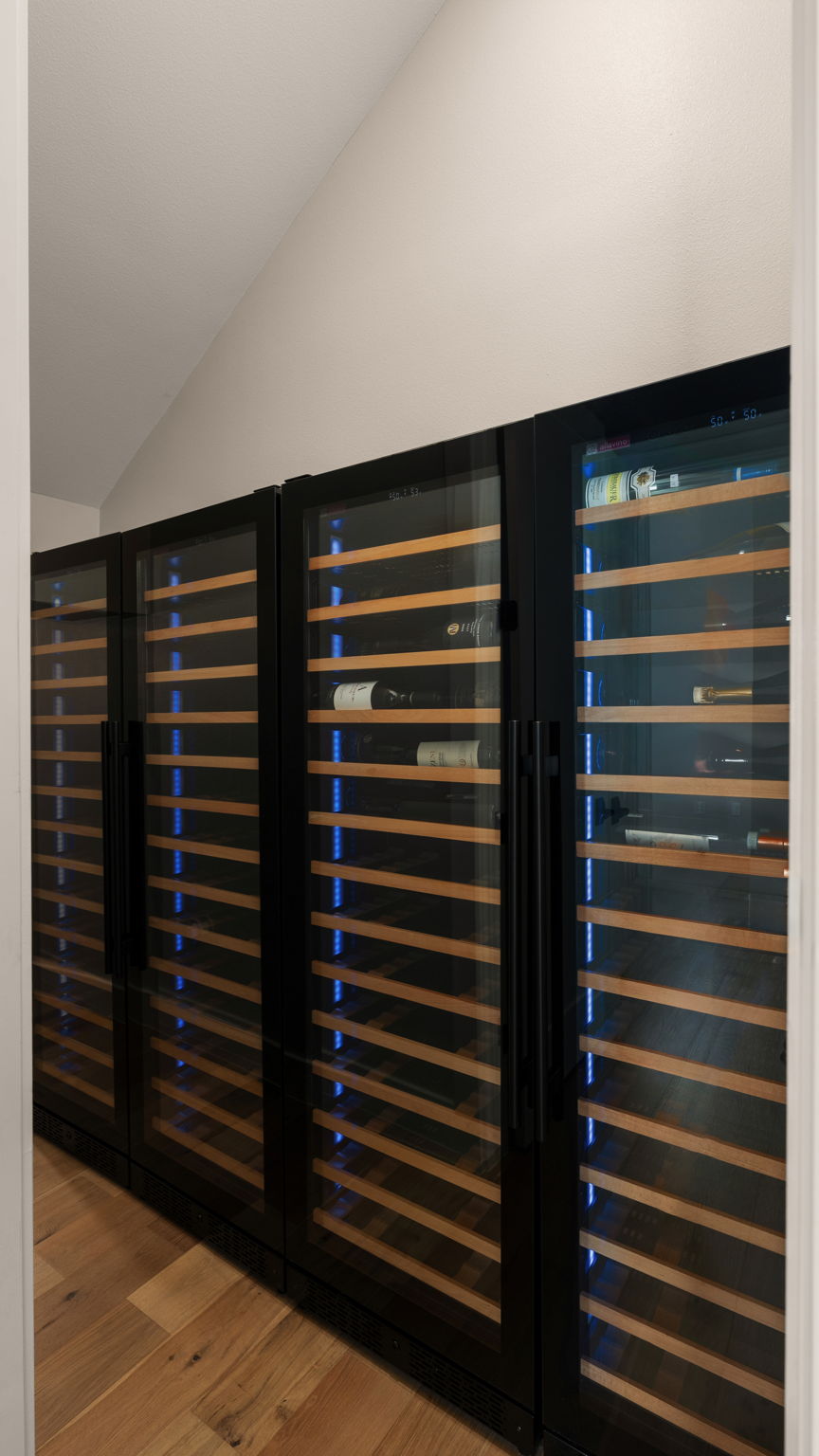 1909 West 40th Street Austin, TX 78731 - Photo 24 of 40 The dedicated wine cellar adds a sophisticated touch and offers the perfect space to store and showcase your collection.