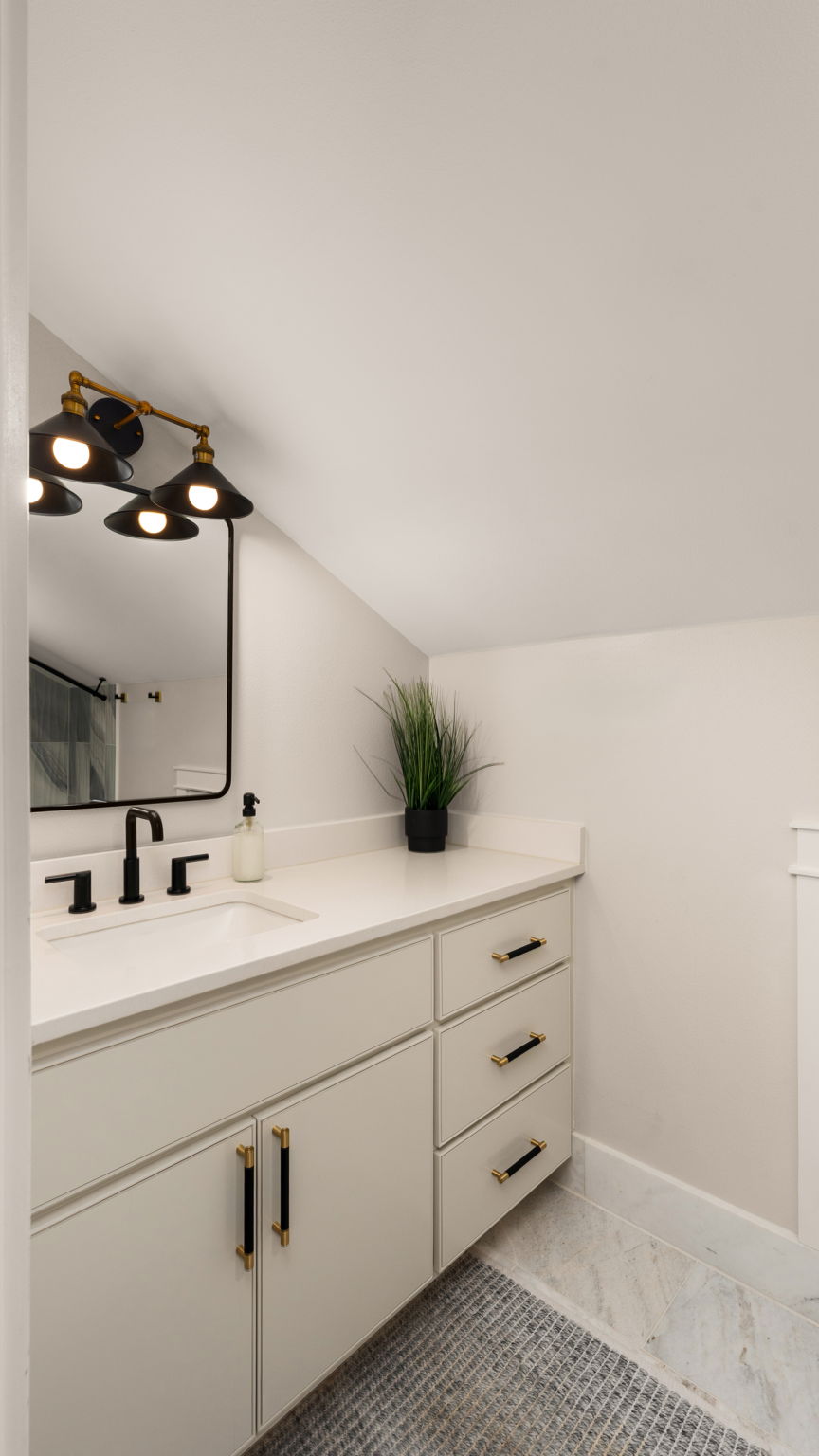 1909 West 40th Street Austin, TX 78731 - Photo 32 of 40 Stylish vanities and clean finishes create a polished and functional design.