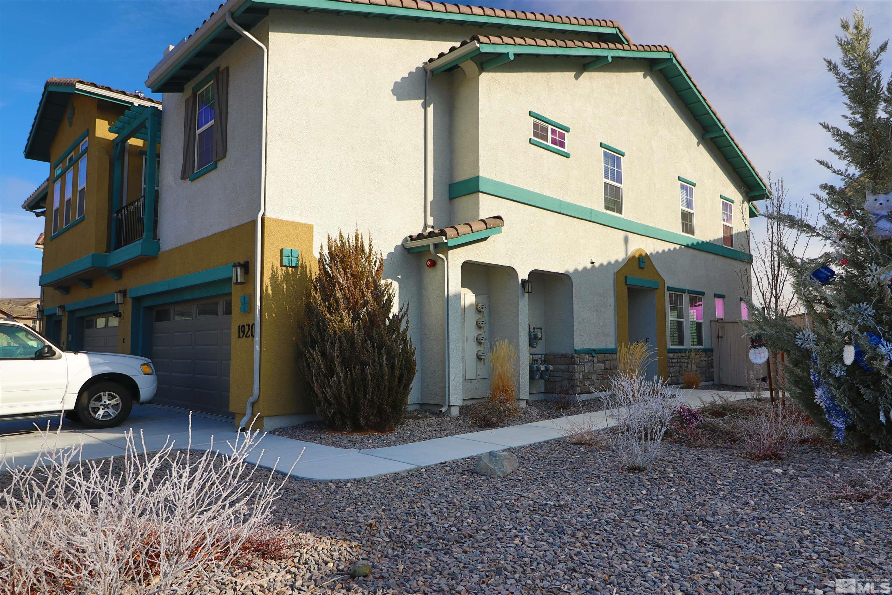 1920 Dark Horse Road, Unit C Reno, NV 89521 - Photo 1 of 26 a view of a house with a yard